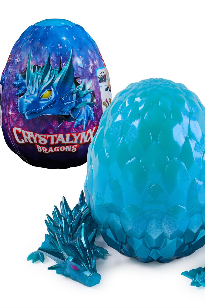 Blue crystal dragon egg with a smaller purple dragon egg in the background, featuring the Crystalyx brand.