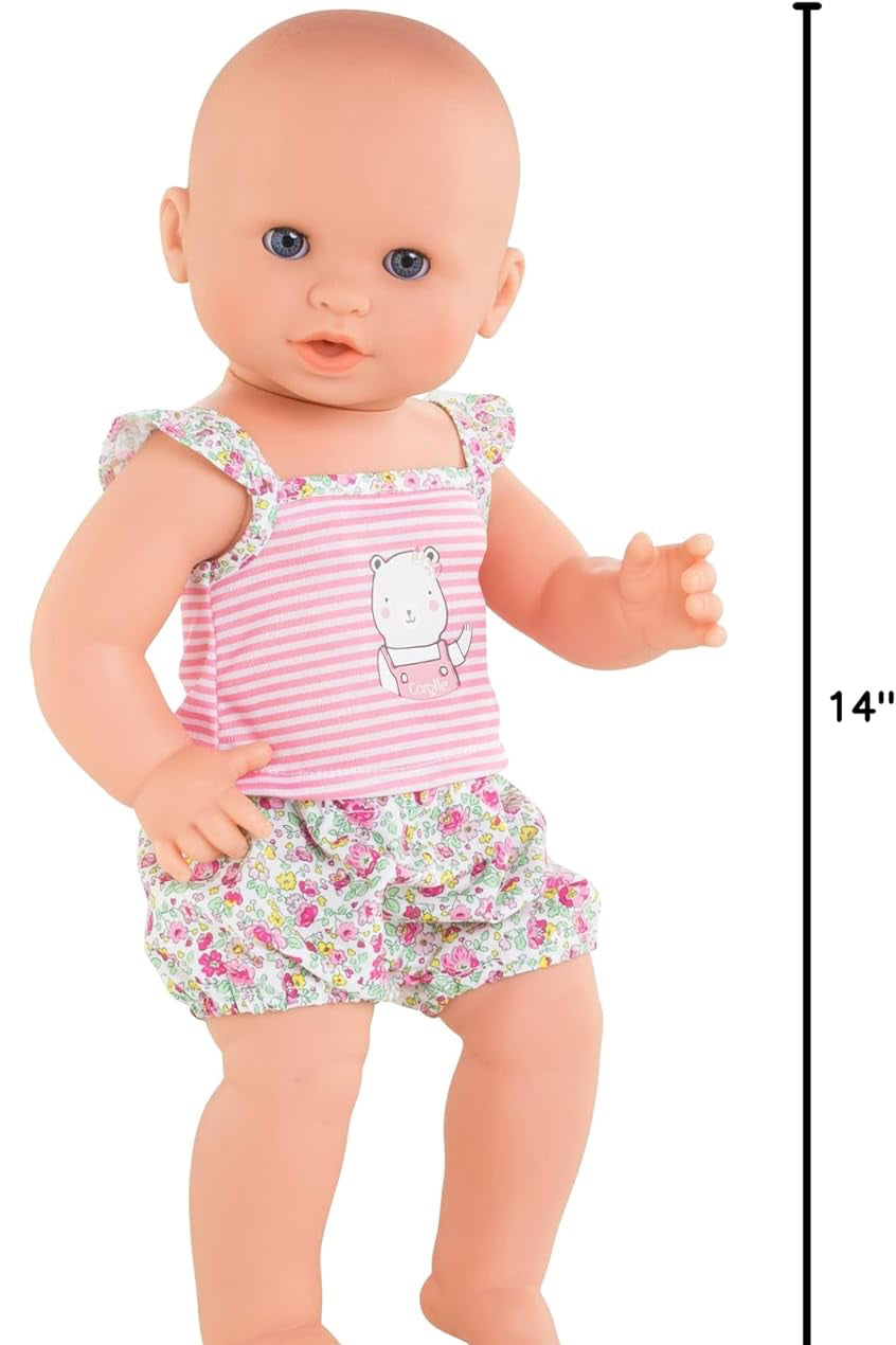 Doll wearing a pink striped top and floral shorts with measurements indicated.