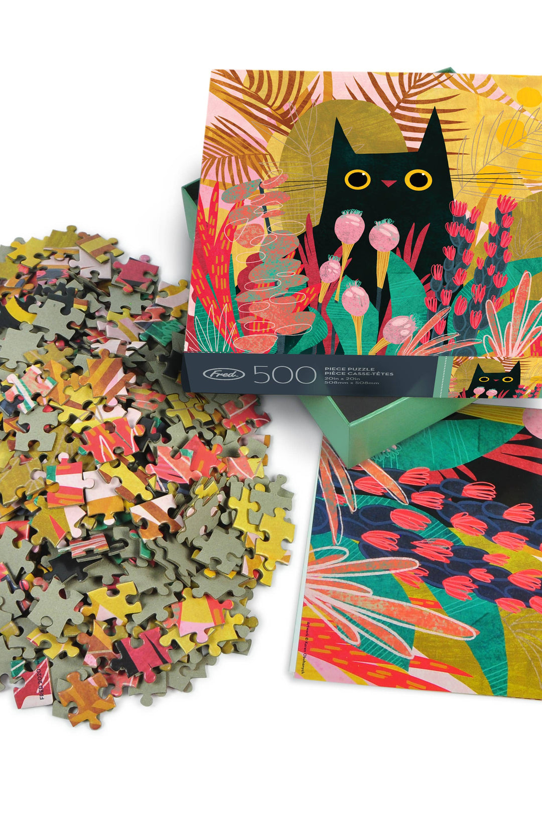 Jigsaw puzzle set with colorful packaging featuring a black cat and floral design.
