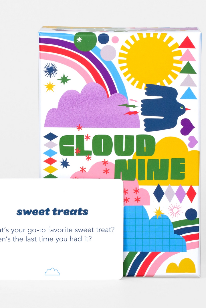 Colorful book titled 'Cloud Nine' with abstract designs on a white background