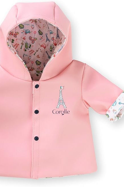 Pink Doll Raincoat with a print cuff and Eiffel Tower on the front. Black faux buttons. 