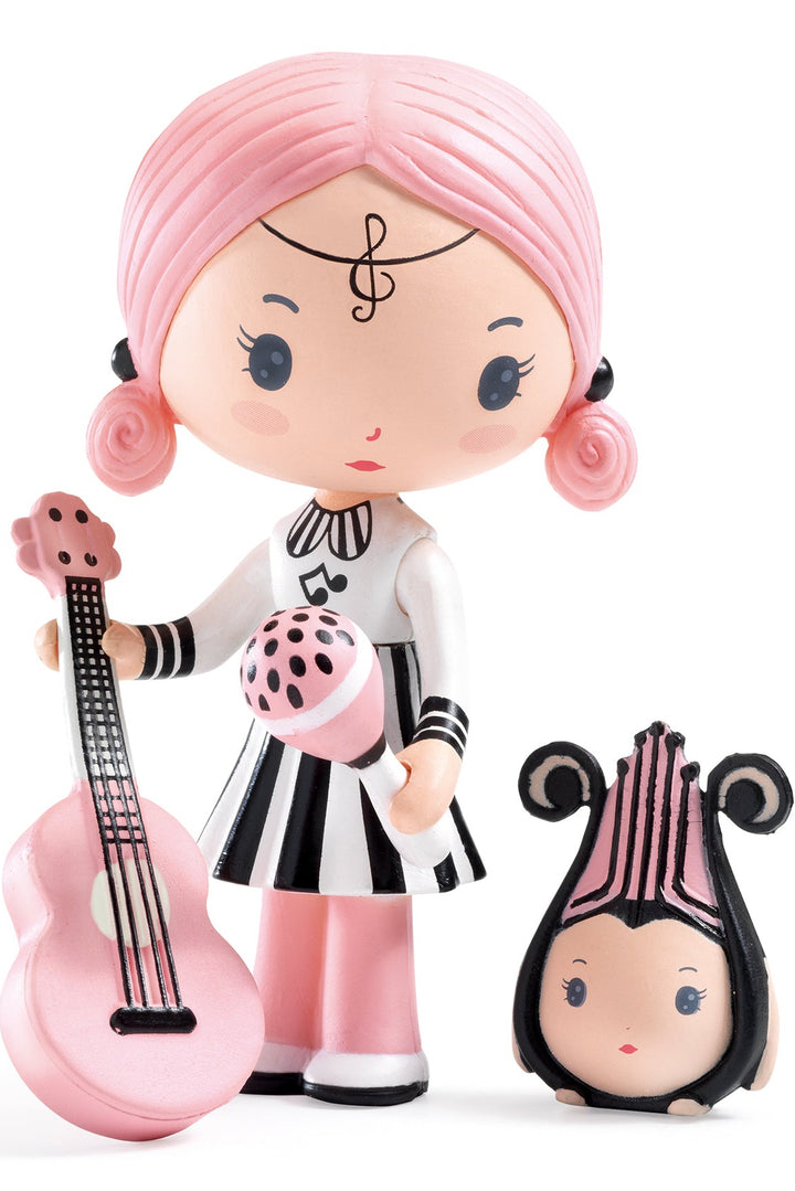 Toy figure with pink hair and a small companion on a white background