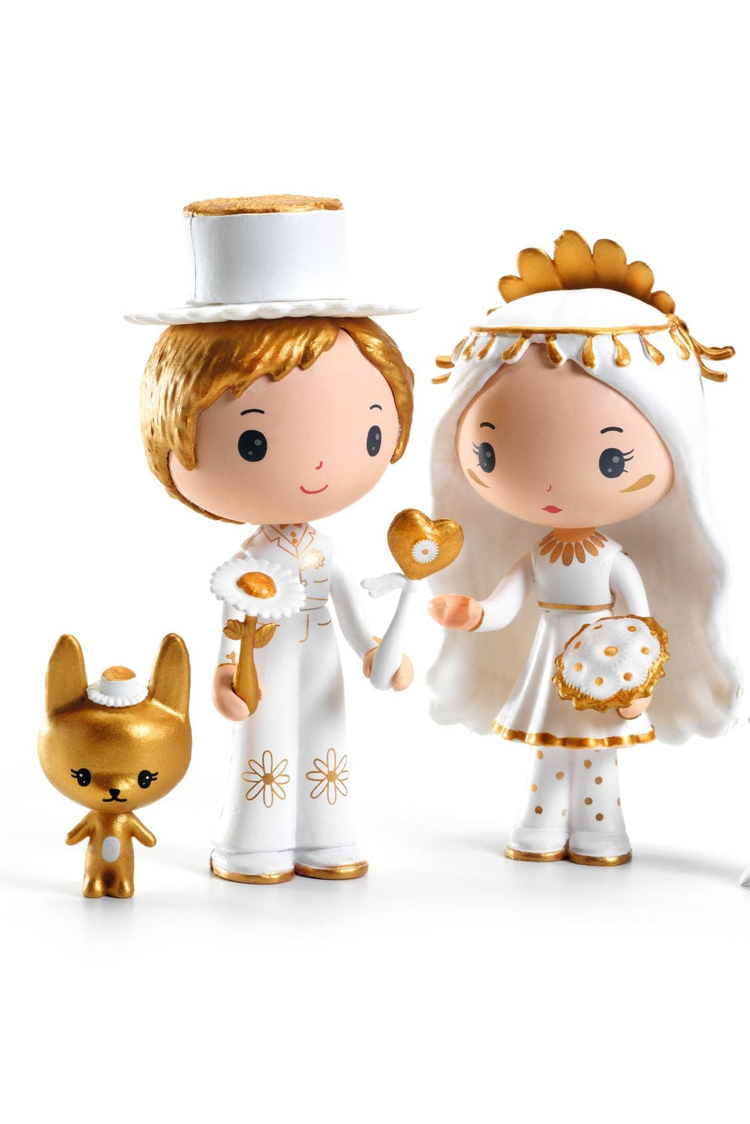 Two figurines in wedding attire with two small animal figures on a white background