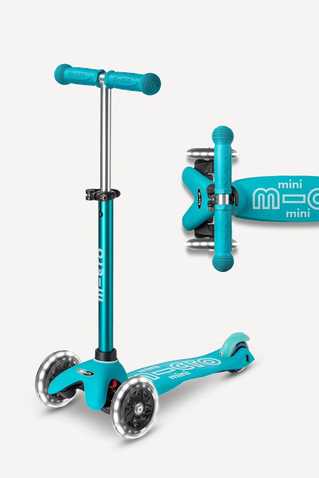 Turquoise scooter with a stand on a white background