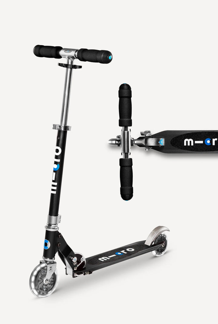 Two micro scooter models on a white background