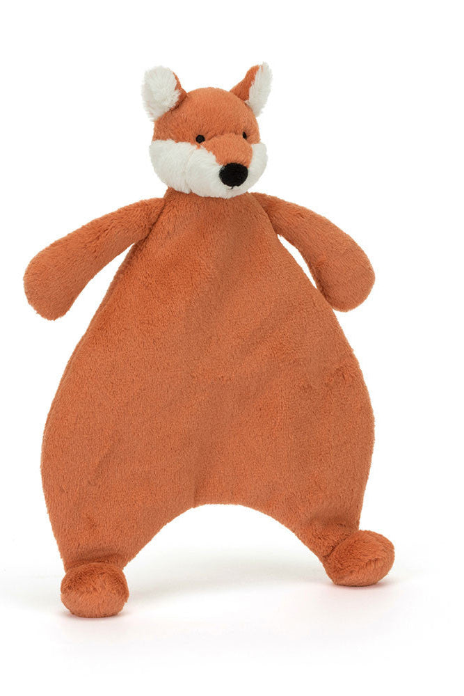 Plush fox toy on a white background