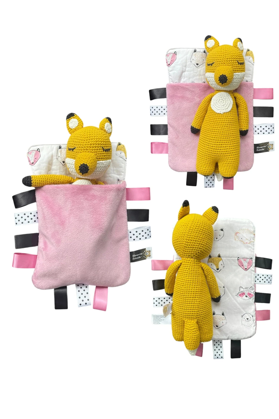 Three yellow fox plush toys with pink and black striped blankets on a white background