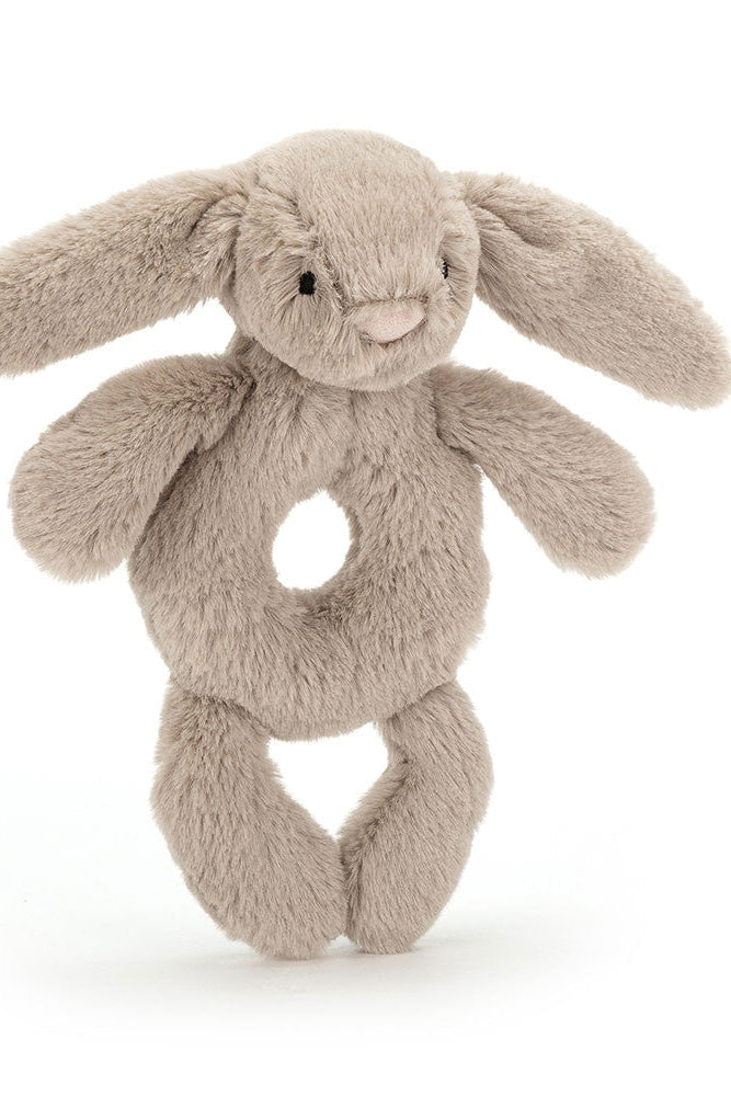 Photo of Jellycat beige ring rattle on white background