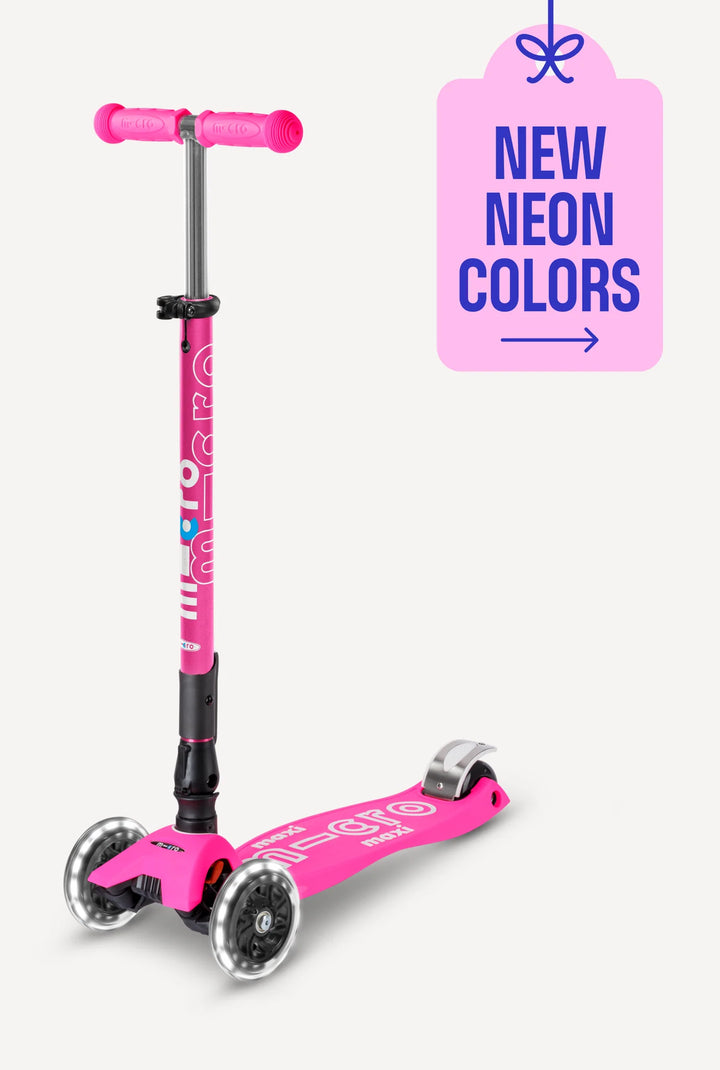 Pink scooter with a tag indicating 'New Neon Colors' on a white background