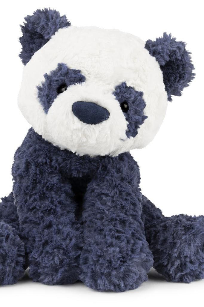 Photo of stuffed animal panda bear black and white on a white background