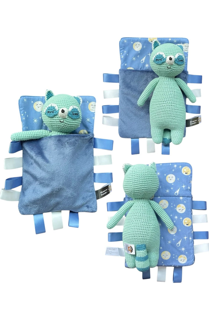 Photo of raccoon stuffed animal with a sleeping bag. Croched