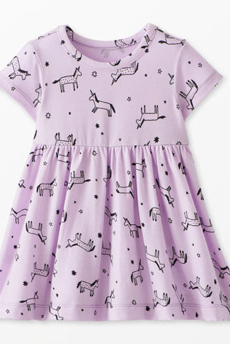 Purple dress with black animal pattern on a white background