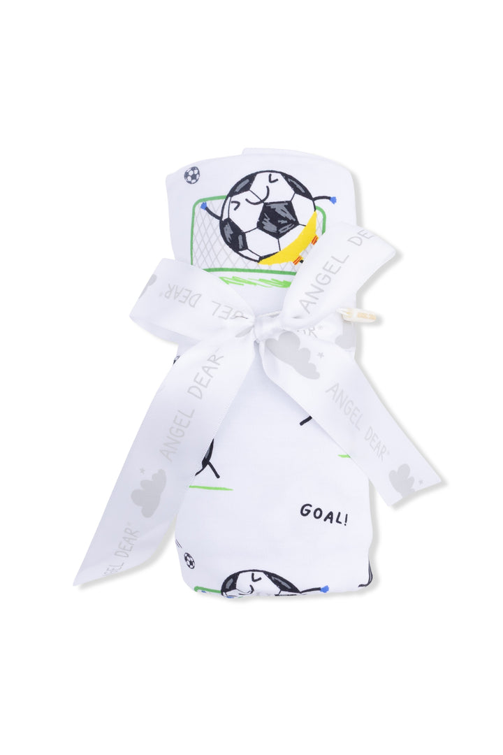 White baby romper with soccer ball design on a white background