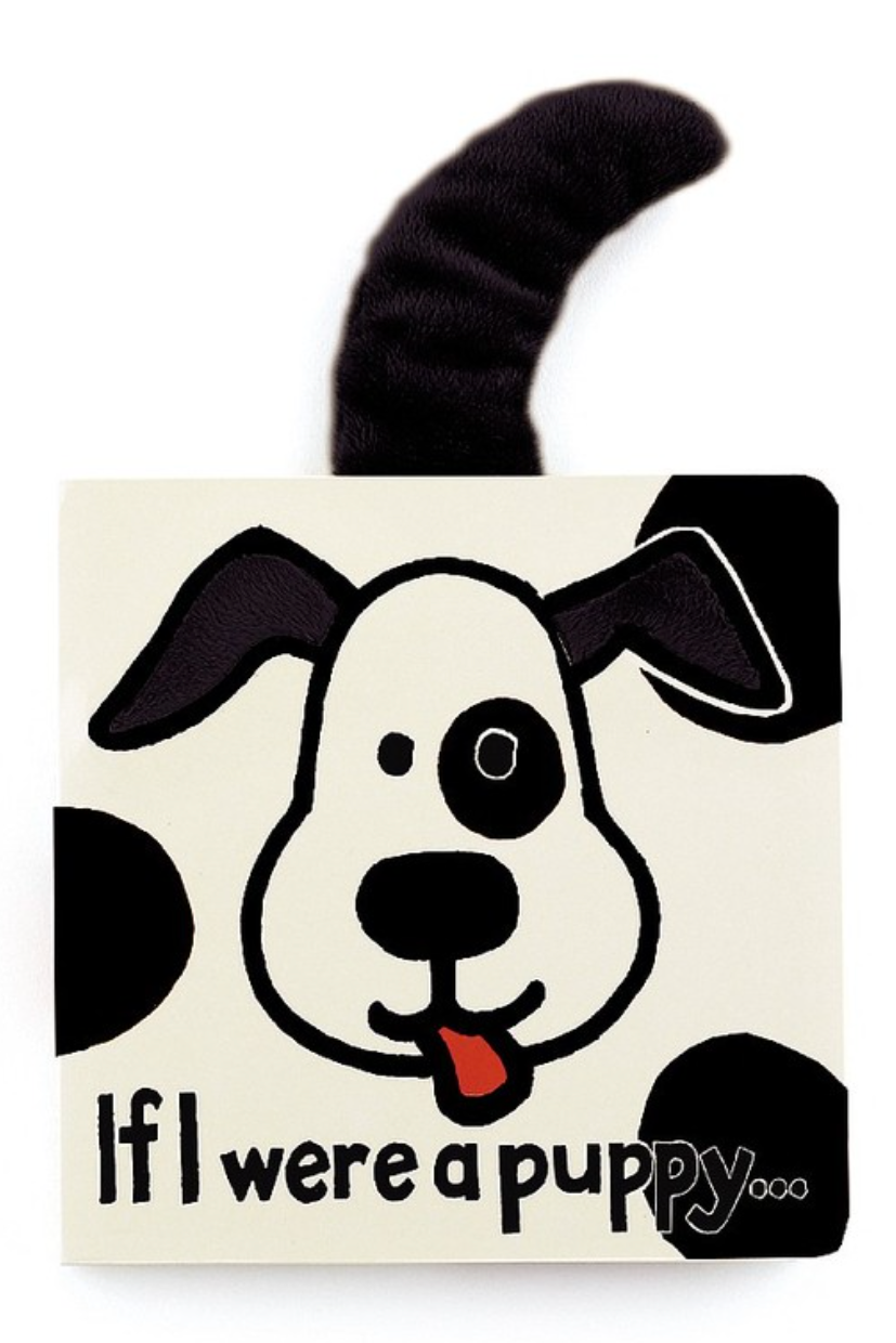 A board book with a illustration of a dog's face and the text 'If I were a puppy. Soft Tail and soft ears. 
